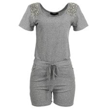 Macaquinho Tecido Elástico com Amarração na Cintura e Tachas Decorativas Macaquinho Tecido Elástico com Amarração na Cintura e Tachas Decorativas