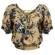 Cropped Soltinho Estampado Com Amarração Nas Costas Cropped Soltinho Estampado Com Amarração Nas Costas